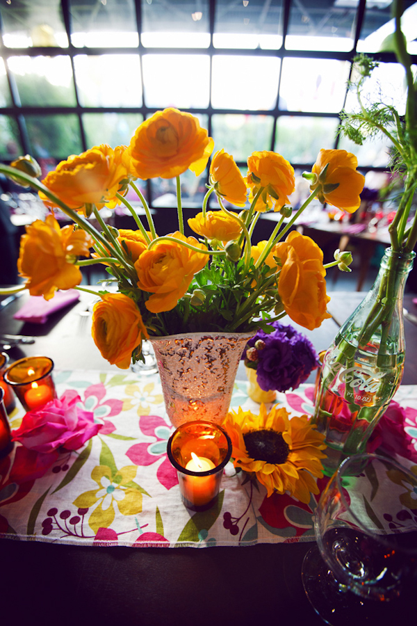 yellow flowers and candles on a tabletop - vintage LA wedding at The Smog Shoppe photo by top Orange County wedding photographer Duke Images